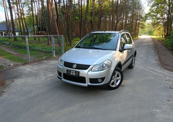 Suzuki SX4 cena 26990 przebieg: 170000, rok produkcji 2009 z Stepnica małe 379